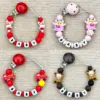 kf S8642f0d7dfa649b59189ca44e32dda49q - Personalised Dummy Clips UK