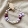 kf Sdedbaa67c56246289b3d1afe4335e841e - Personalised Dummy Clips UK